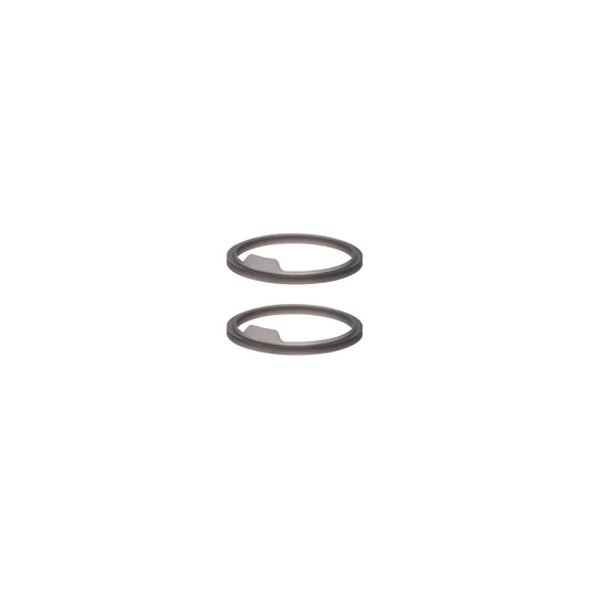 Two metal washers on a white background